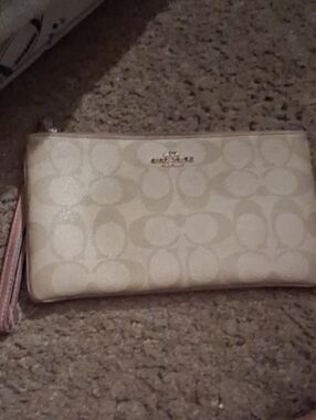 Coach Cream Logo Wristlet with Pink Trim